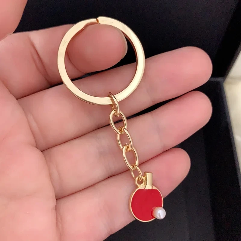 黒赤スポーツ卓球テニスキーチェーンクリエイティブ卓球バットキ - Table Tennis Keychain のレビューと価格